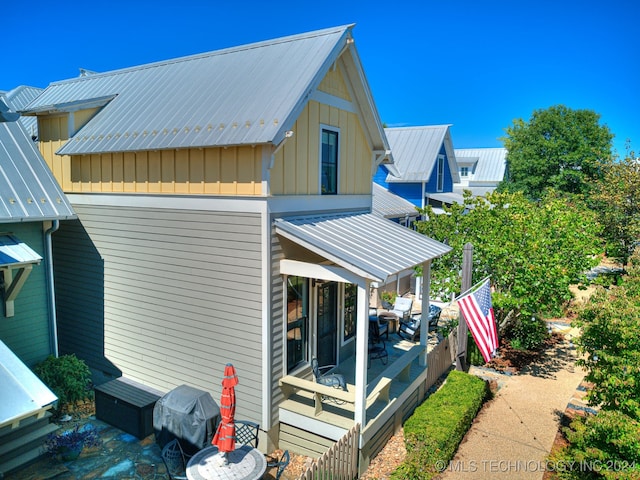 view of home's exterior featuring a deck