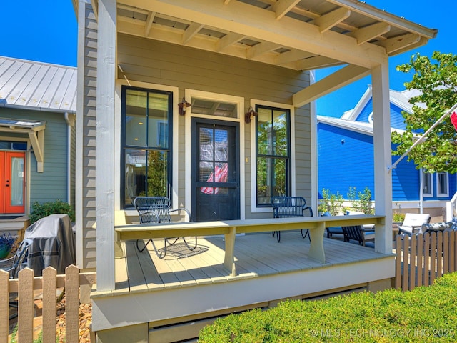 doorway to property featuring a deck