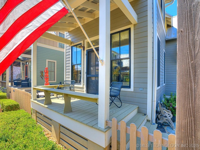 wooden terrace featuring a porch