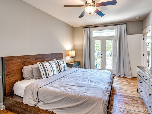 bedroom featuring light hardwood / wood-style flooring, access to exterior, ceiling fan, and french doors