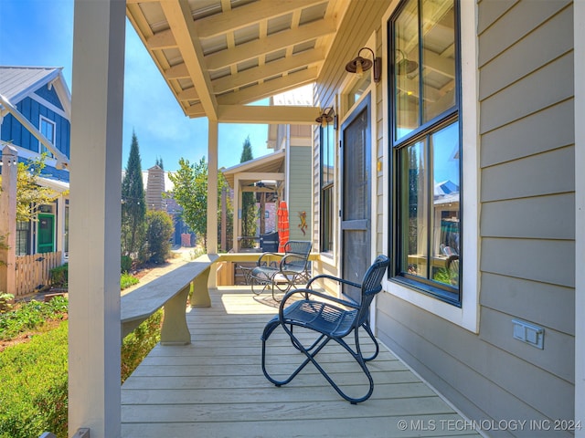 wooden deck with a porch