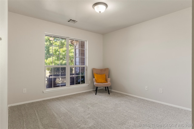 living area with carpet floors