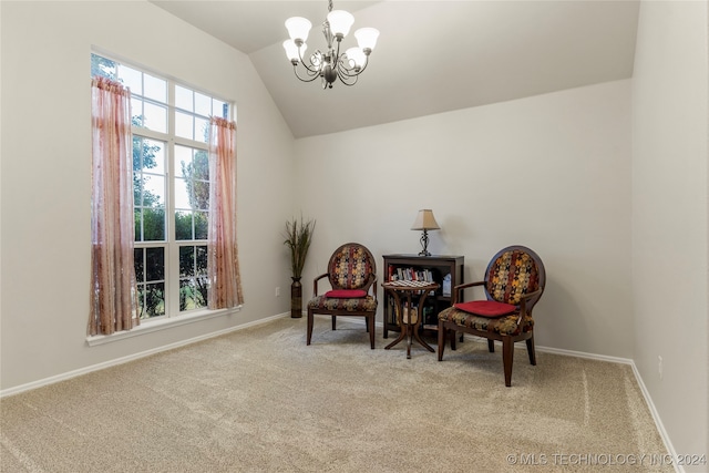 living area with a notable chandelier, light colored carpet, and vaulted ceiling