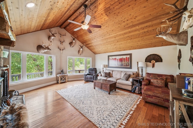 living room featuring wooden ceiling, wood-type flooring, beamed ceiling, and ceiling fan