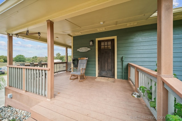 wooden deck with a porch