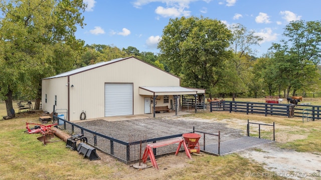 view of outbuilding with a garage