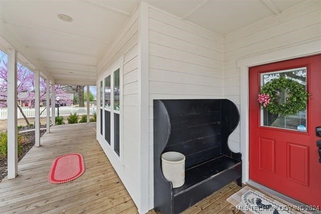 property entrance featuring fence