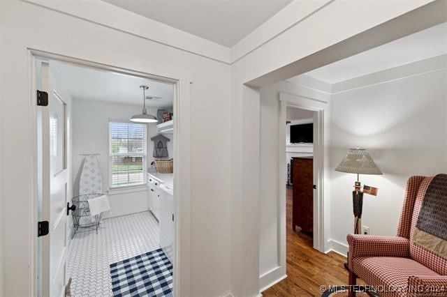 hallway with dark wood-type flooring