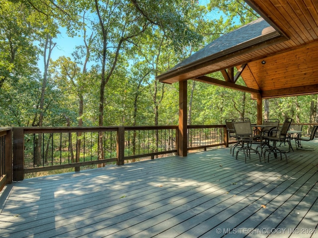 wooden terrace with a gazebo