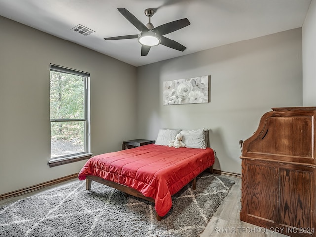 bedroom featuring ceiling fan and light wood-type flooring