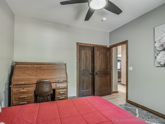 unfurnished bedroom featuring light hardwood / wood-style floors and ceiling fan