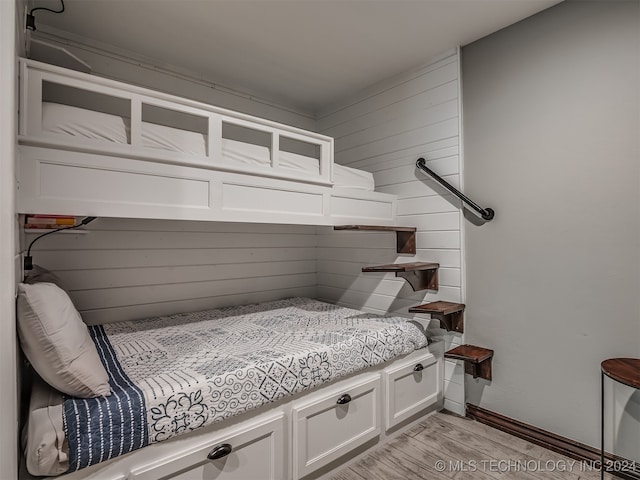 bedroom with light hardwood / wood-style flooring