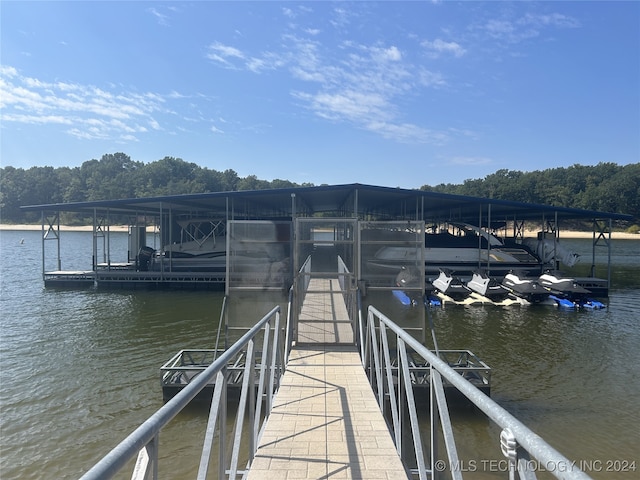 view of dock with a water view