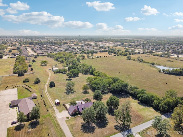 bird's eye view featuring a rural view and a water view