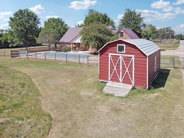 view of outdoor structure with a yard