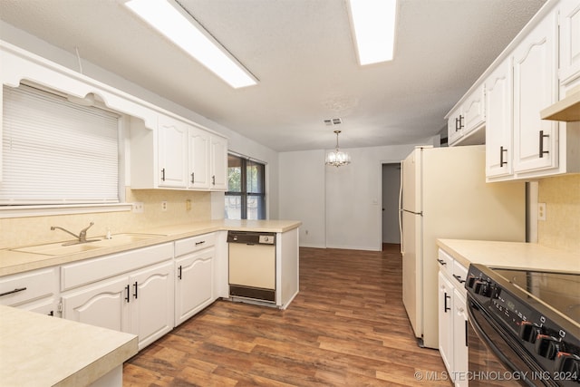 kitchen with dark wood-type flooring, kitchen peninsula, pendant lighting, black range with electric stovetop, and dishwasher