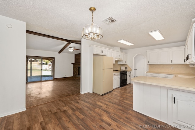 kitchen featuring pendant lighting, dark wood-type flooring, white cabinets, and black / electric stove