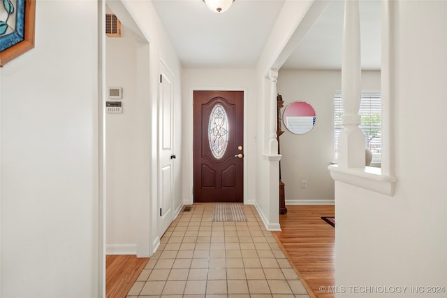 foyer with light wood-type flooring