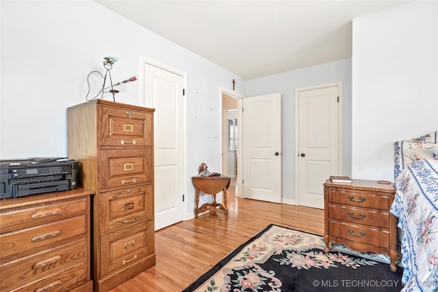 bedroom featuring light hardwood / wood-style flooring