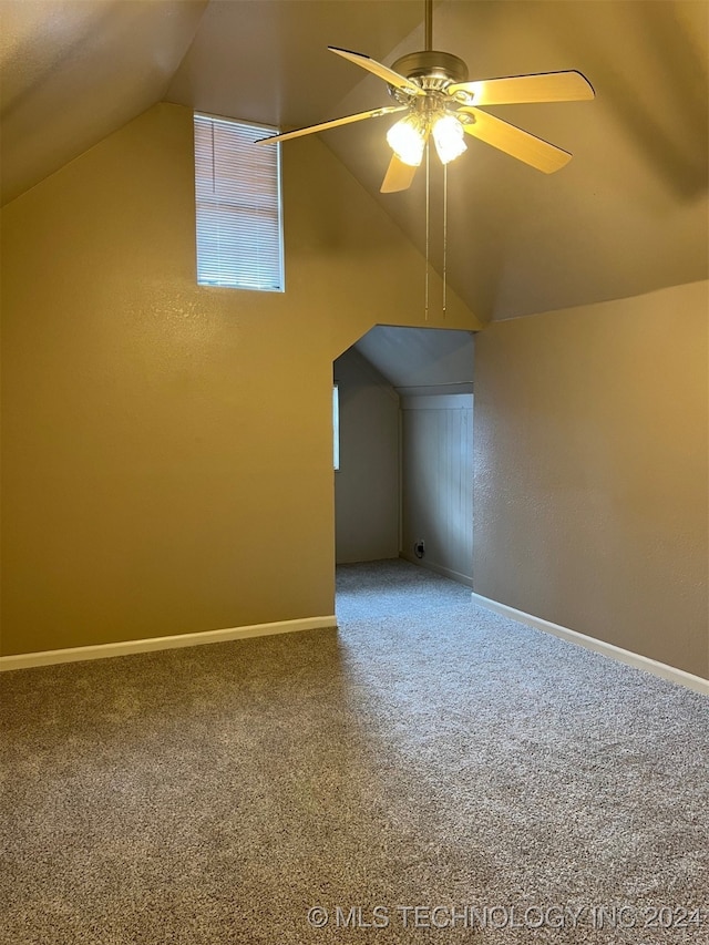 bonus room featuring carpet floors, lofted ceiling, and ceiling fan