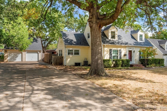 new england style home featuring central AC