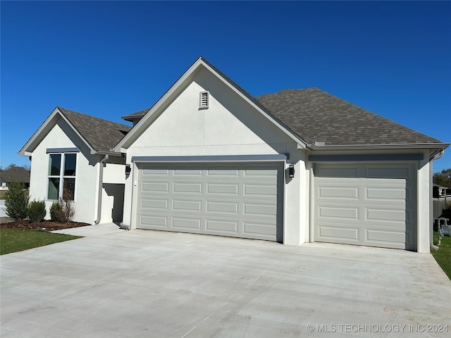 ranch-style house with a garage