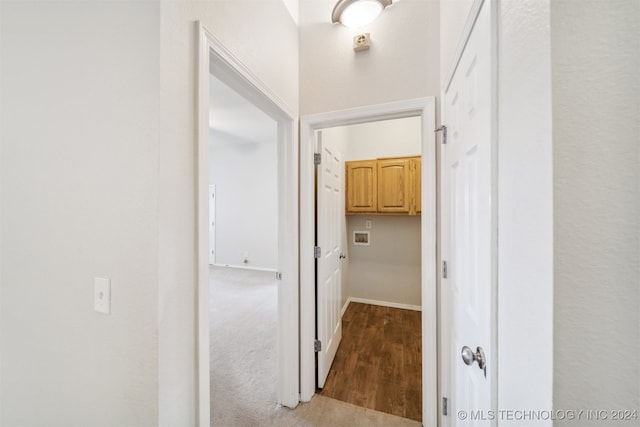 hallway featuring wood-type flooring