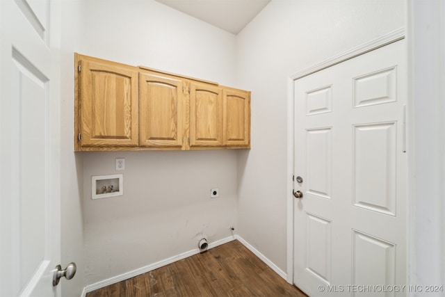 washroom with hookup for an electric dryer, washer hookup, dark hardwood / wood-style floors, and cabinets