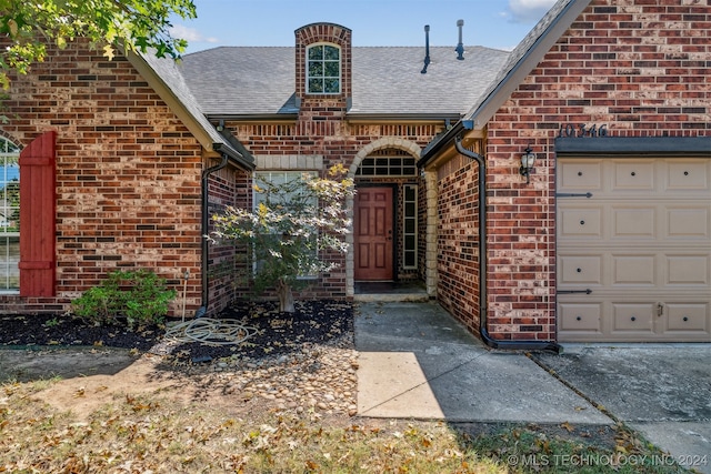 entrance to property with a garage