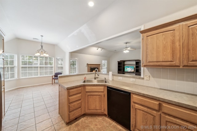 kitchen with dishwasher, lofted ceiling, sink, and kitchen peninsula