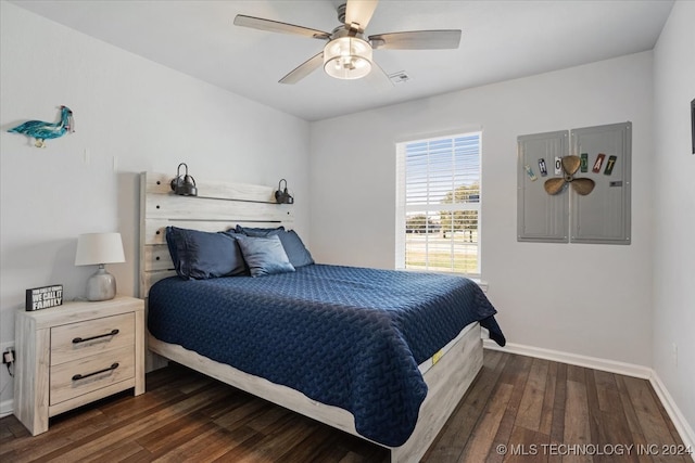 bedroom featuring ceiling fan and dark hardwood / wood-style floors