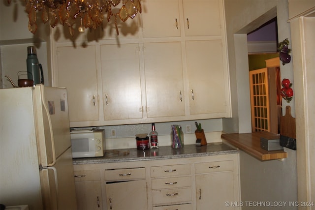 kitchen featuring white appliances