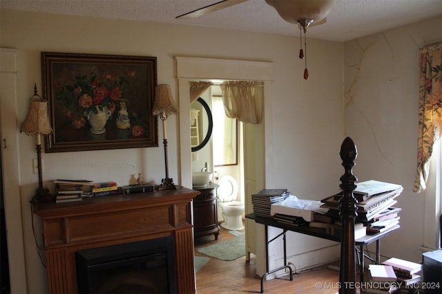 512 N 4th St, Henryetta, OK 74437 - interior space with light wood finished floors and a textured ceiling