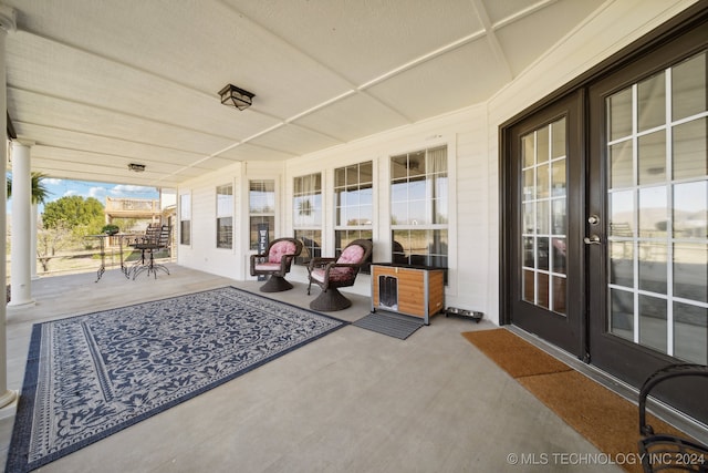 view of patio featuring french doors