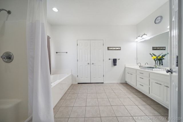 bathroom with independent shower and bath, vanity, and tile patterned flooring