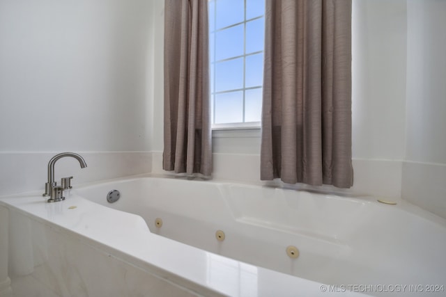 bathroom featuring a tub