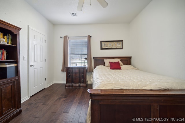 bedroom with ceiling fan and dark hardwood / wood-style flooring