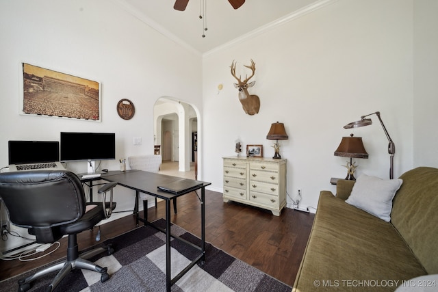 home office featuring high vaulted ceiling, ornamental molding, ceiling fan, and dark wood-type flooring