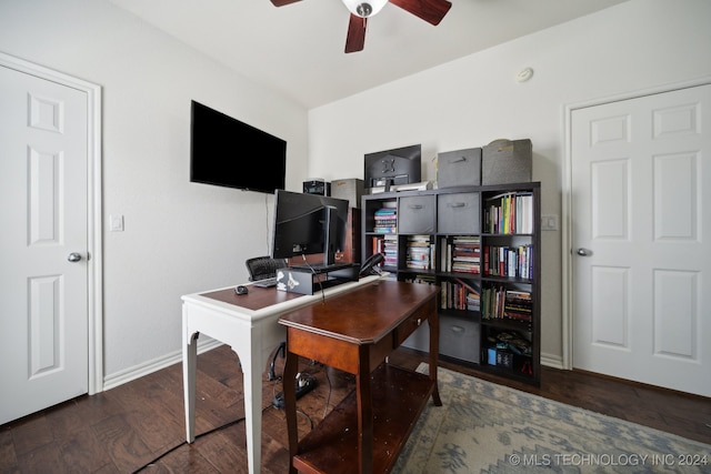 office space featuring ceiling fan and dark hardwood / wood-style floors