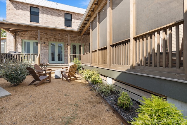 exterior space featuring a wooden deck