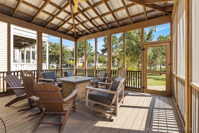 sunroom with vaulted ceiling