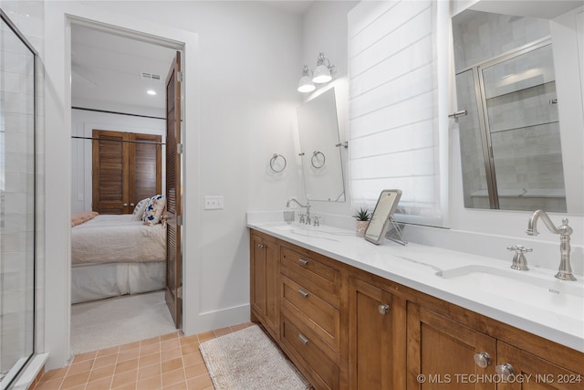 bathroom featuring walk in shower and vanity