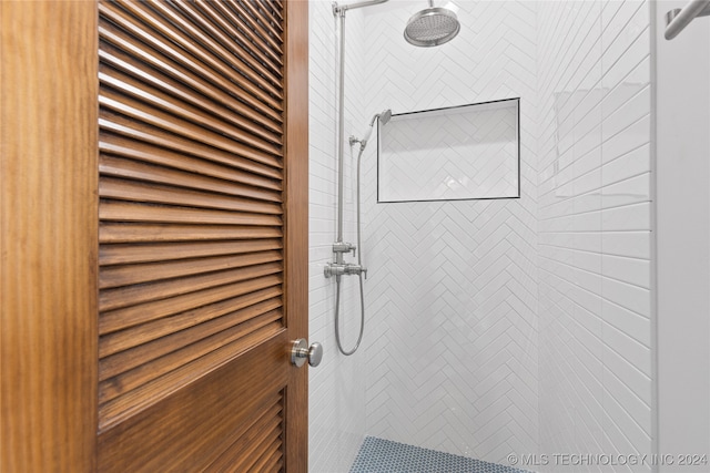 interior space with a tile shower