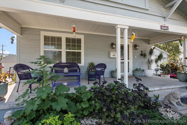 view of patio / terrace featuring an outdoor hangout area and a porch