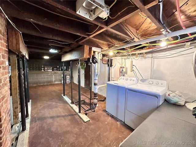 basement featuring washer and clothes dryer