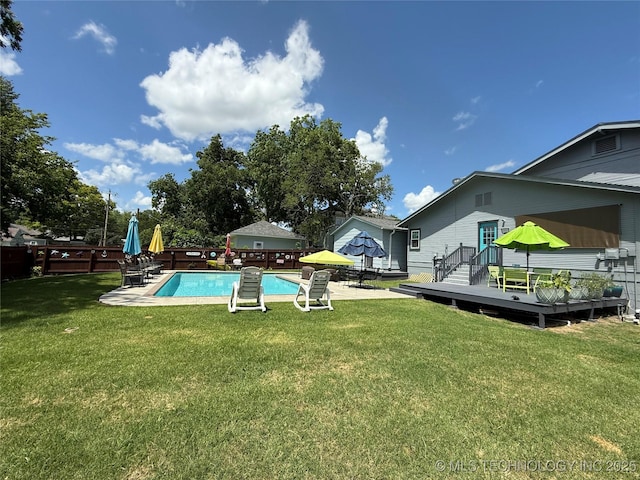 1433 S Dewey Ave, Bartlesville, OK 74003 - fenced backyard featuring a deck