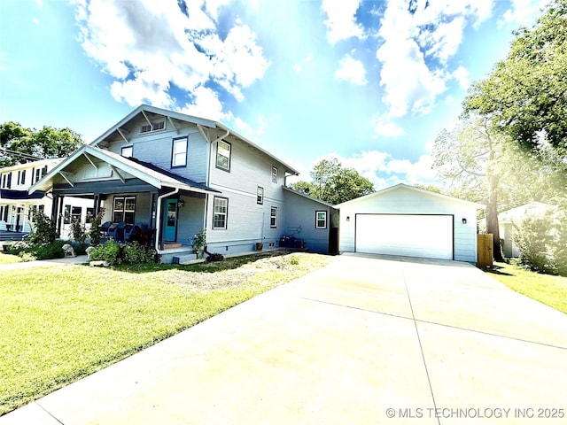 1433 S Dewey Ave, Bartlesville, OK 74003 - view of front of house with a porch, a front lawn, and a detached garage