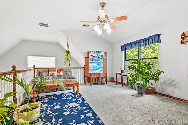 rec room featuring carpet, ceiling fan, and lofted ceiling