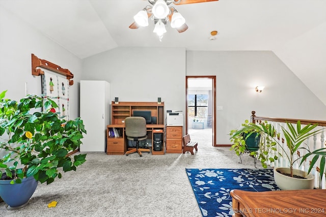 office featuring carpet, ceiling fan, and lofted ceiling