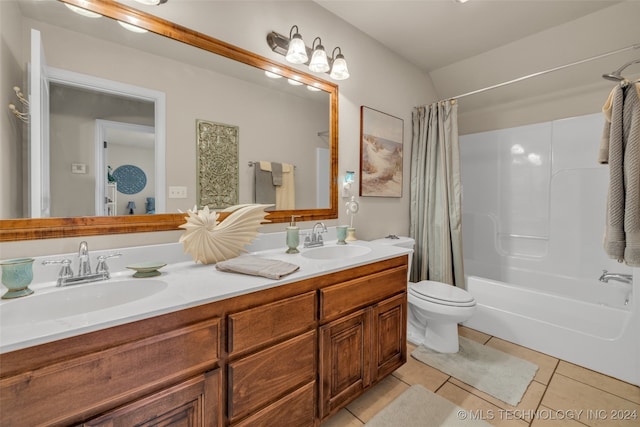 full bathroom featuring tile patterned flooring, vanity, toilet, and shower / tub combo with curtain